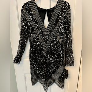 Beautiful Black/Silver Beaded Dress. Size 10  - brand new